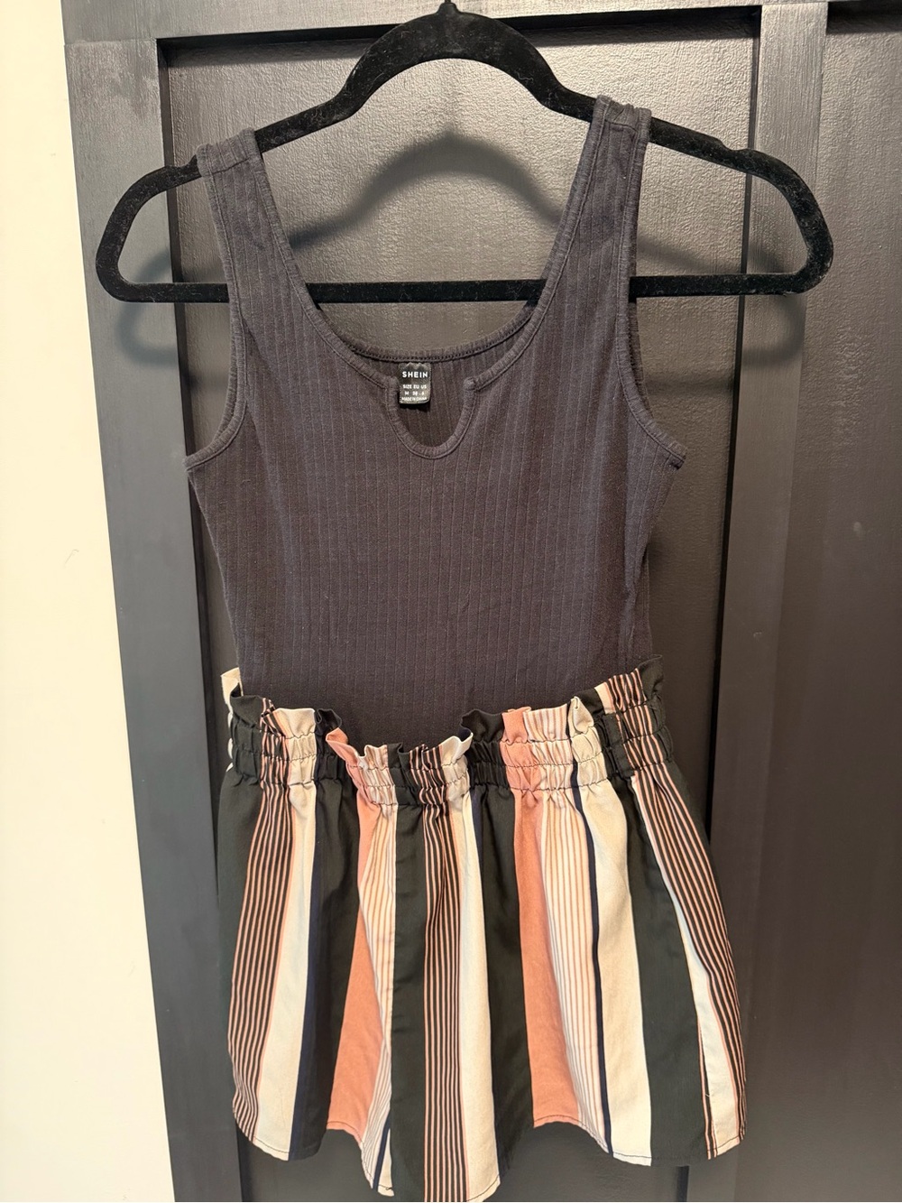 SHEIN Woman’s Black Ribbed Romper with Striped Shorts
